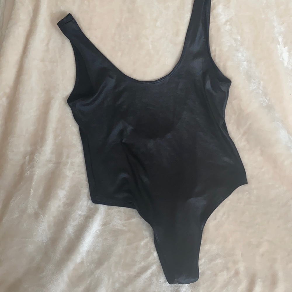 Thong bodysuit “wet look” fabric